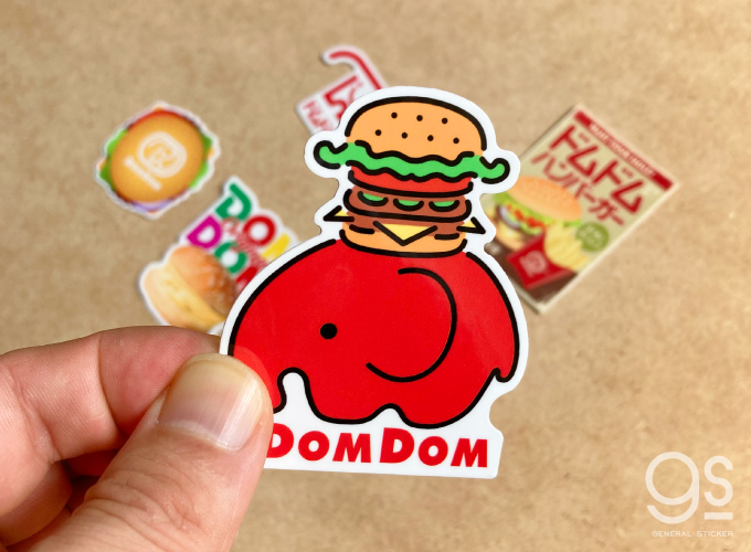 ドムドムハンバーガー 塩ビステッカー 旧ロゴ（白）ハンバーガー どむぞうくん ドムドムDOM001 株式会社 ゼネラルステッカー | 卸売・  問屋・仕入れの専門サイト【NETSEA】