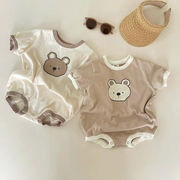 夏の乳幼児のかわいい小熊のカジュアルな半袖のワンピース男女の赤ちゃんの漫画の登山服のおしりの服
