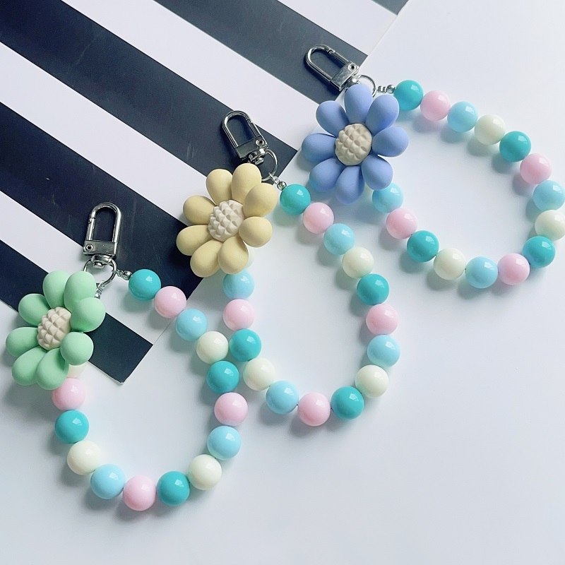 韓国風のかわいい アクリル フラワーズ ビーズキーホルダー 男性と女性のバッグペンダント 金矢