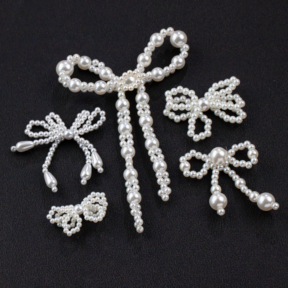 リボンモチーフ ロング 大きめ アクセサリーパーツ 可愛い ビーズ資材 揺れる ハンドメイド おしゃれ 白