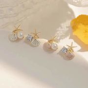 新しいS925シルバーニードルヒトデシェルの女性のイヤリング韓国の気質非対称真珠のイヤリング