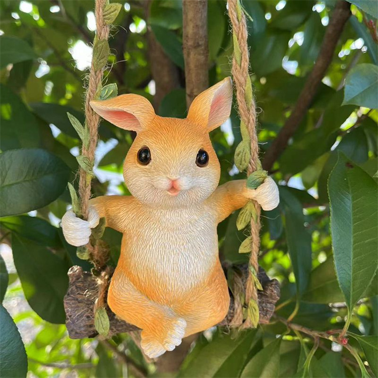 庭のベランダの屋外ブランコのウサギの置物 庭のベランダの屋外ブランコのウサギの置物