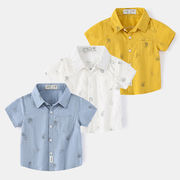 新しい春夏の子供服のトップス、男の子のシャツの半袖、漫画のカーディガンのシャツ