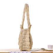 シンプルで透かし彫りのある円形のシンプルなワンショルダーの草編みバッグハンドフック編みバッグビ