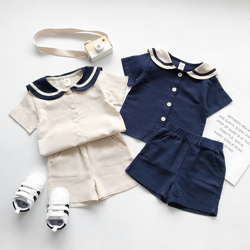 韓国子供服2022年夏の新しい男の子と女の子のネイビースタイルの綿とリネンの半袖ショーツスーツ
